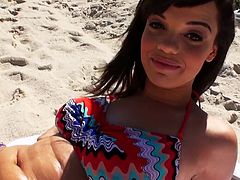 Our guy is trying to convince this black haired sexy babe while she lying on the beach and enjoying the sun. When she is fully convinced the big dick guy is taking her to a quite place where she reveals her big tits and shaved cunt. Then she is stuffing her pretty mouth with my huge man meat.