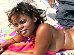 Take a look at this mami's sexy body in a two piece bikini while she tans on the beach before the guys take her back to the hotel to have some real fun.