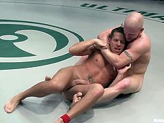 Luke Riley and Shane Frost are having a battle on tatami. They struggle with each other vigorously and then the loser pleases the winner with a blowjob and welcomes his schlong in his butt.