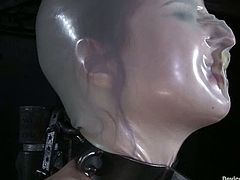 Hot redhead slut gets tied up and whipped. She also gets gagged with a ball. Later on she also gets choked and toyed.