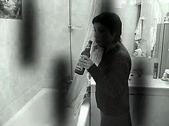 woman drink beer in shower (Real Spycam)