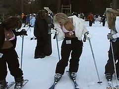 After going skiing, these three lesbians are going to keep having fun together with an amazing threesome with toying, licking and strapon fucking.