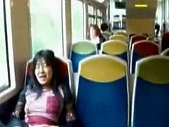 Asian girl masturbating on a public train