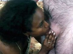 Slutty black wench has got big natural boobs and round phat ass. She also has got strong cock sucking skills. Enjoy watching black girl sucking white dick deepthroat.