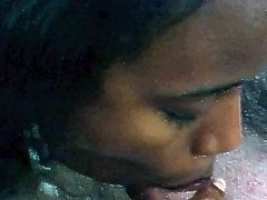 Slutty black wench has got big natural boobs and round phat ass. She also has got strong cock sucking skills. Enjoy watching black girl sucking white dick deepthroat.