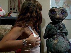 Even E. T. has a boner, after seeing this hot brunette, playing with her pussy. Maybe things will really get interracial, if she keeps up that way. Damn, she's fucking hot and her tight, shaved pussy needs a hard one, inside it. Let's see, if this hottie will get a close alien encountering!