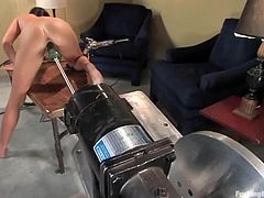 Busty brunette Devi Emerson is having fun with her fucking machine indoors. She rubs her sweet pussy ardently and then gets her pink slit pounded hard.