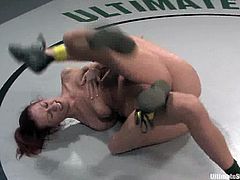 Brunette and redhead girls wrestle in a ruthless fight. After that Ariel toys Smokie because she wins a fight. In addition the redhead girl licks brunette's pussy.