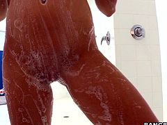 Press play and take a look at this hottie taking a shower before giving this guy a handjob you'd love to get yourself.