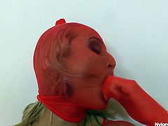 Blonde hair, blue eyes and a lot of red nylons! Meet Sophia and her nylon fetish! The sexy blonde is turned on insanely by the feeling of nylon on her body. She dressed up in it and made a hole between her thighs to masturbate. Look at her how much fun she has, wanna see more?