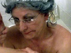 This spoiled granny is far from being shy! She spreads her legs wide indicating how bad she wants her friend to rub her hairy pussy.