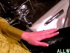 Kinky ladies taking a fully clothed bath