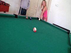 Very sexy blonde chick in pnk outfit plays pool with her daddy's best friend. She got her mouth on his big dick and he nailed her tight pussy for a huge cumshot in her mouth.
