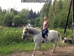 Check out this horny russian amateur showing off her nice titties in the woods. Then she sucks cock and got fucked in a barn at night!