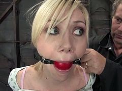 Blonde cutie Samantha Sin is getting her punishment for being a nasty girl. Some guy binds her in a cellar and rubs her vag with a dildo until she gets a bright orgasm.