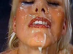 After having her holes nailed right, blondie gets covered in creamy cum