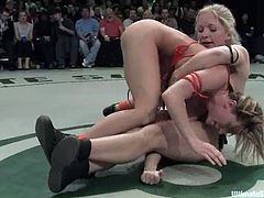 Four girls fight in 2 vs 2 battle. They demonstrate everything they can. Then girls from the losing team lick pussies and get toyed rough right in a ring.