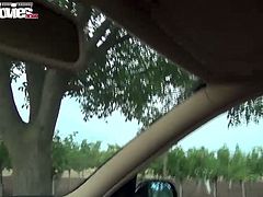 This boobalicious brunette whore loves the fact that her lover's dick is pretty thick so it turns her on to give him a blowjob right in his car.
