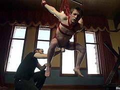 Sweet boy Andrew hangs, tied up with red rope, while his executors ass and mouth fuck him hard with dildos. Being treated like a cheap whore, Andrew starts to accept who he is and loves it! Stay with him and see, how he obediently enjoys the way these guys drill him and maybe more! Such a boy needs some meat!
