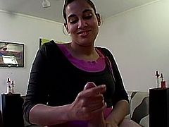 A kinky Indian bitch and some dude are having fun in an office. She slut kneels in front of the stud and begins to lick and rub his wang passionately.