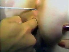 Stunning retro chick with perky boobs toys her hairy vagina. After some time she starts to shove sex toys in her ass in close-up video.