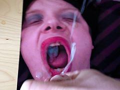 Creaming on crossdresser's open mouth