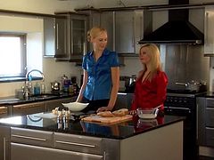 two blond girls in the kitchen