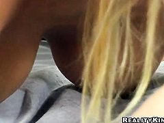Blonde Ryana with giant knockers and hairless twat displays her naughty parts