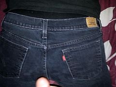 Cumshot on black jeans
