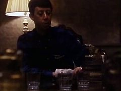 Some guys talk about things wearing fancy costumes. Later on one raven haired babe drinks tea and wearing sexy silky robe.