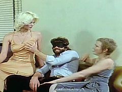 Pretty one and only stunning blonde porn goddess Seka with big hotoers and awesome body in tempting dress and lingerie gives head to her partner in vintage footage.