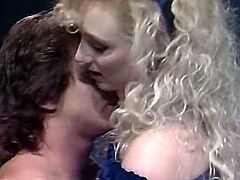 This curly-haired blondie looks very tempting in her sexy black stockings. Shapely cutie pleases her lover wiith a blowjob. Then she wants him to return the favor and eat her delicious fanny. Horny guy licks her pretty twat without hesitation and with pleasure.