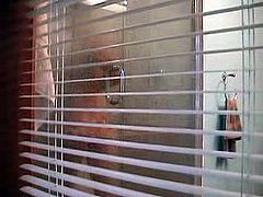 Hidden cam - Through window-Brunette shower