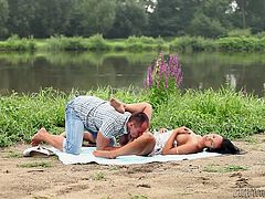 Slim and hot brunette girl walks with her man in the countryside. She kisses with the guy. After some time she lifts a dress up and gets her vagina licked. In addition she gets fucked from behind.