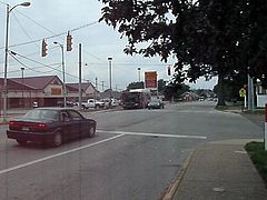 lincoln bus going through on Lincoln street and walnut