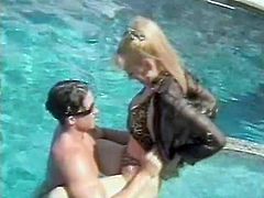 Sexy blonde takes sunbathes with her muscled boyfriend by the pool. After some time they start to fuck. She gives passionate blowjob and gets fucked in a missionary position.