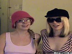 Share this with your friends! Two ladies wearing glasses and hats do a crazy threesome. They love sucking this man's big prick like two whores!