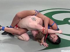 Madison Young and Wenona are having fun on tatami. They wrestle with each other brutally and then the blonde fucks the brunette with a strapon.