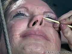 Realtime Bondage brings you a hell of a free porn video where you can see how the naughty brunette Rain DeGrey tortures a naughty blonde slave while assuming very hot poses.