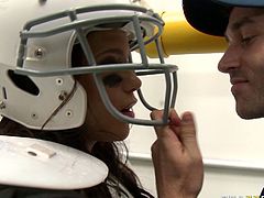 Torrid brunette hottie Nikki Cruz looks hot wearing american football uniform. She sucks big cock wearing the helmet. Then she strips exposing her tits. The guy pours up water on her tits and then finger fucks her intensively.