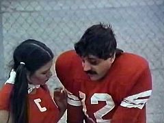 Vicious fair haired whorish cheerleader heals the foofball player who was hurt. She does it on table and one more player joins them. The treatment turned out to be hot and dirty. Watch this slutty babe in The Classic Porn sex clip!