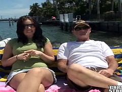 Slutty brunette Linzy is having fun with some dude on a yacht. She favours the dude with a blowjob and then they bang in the reverse cowgirl and other positions.
