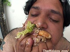 Alicia Alighatti loves some food fetish and she stuffs her fat man's mouth with a burger and then she bends over to get fucked from behind.