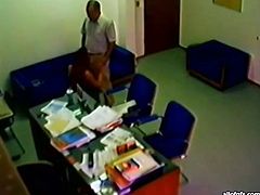Skanky brunette chick strips in front of her boss. She kneels down taking hard dick in her mouth. She