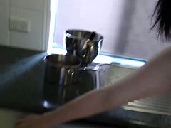 Playing nude whit milk in the kitchen