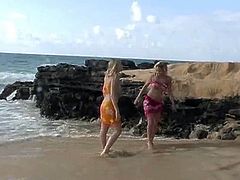 Alison Angel and her smoking hot girlfriend hit the beach in sexy little bikinis then strip naked and get naughty in the sand.