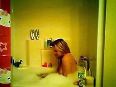 Cute Blonde play in the bath