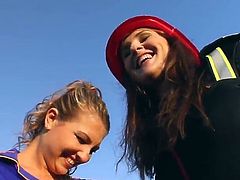 Candy and July pose for the camera in firefighting uniform outdoors. Then these hotties enter a house and have a threesome sex. These chicks get banged and also swap cum.