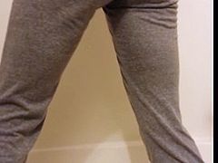Girl bates with sweats on and shows how wet she is