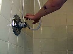 cute hairy girl gets off in the shower with shower head